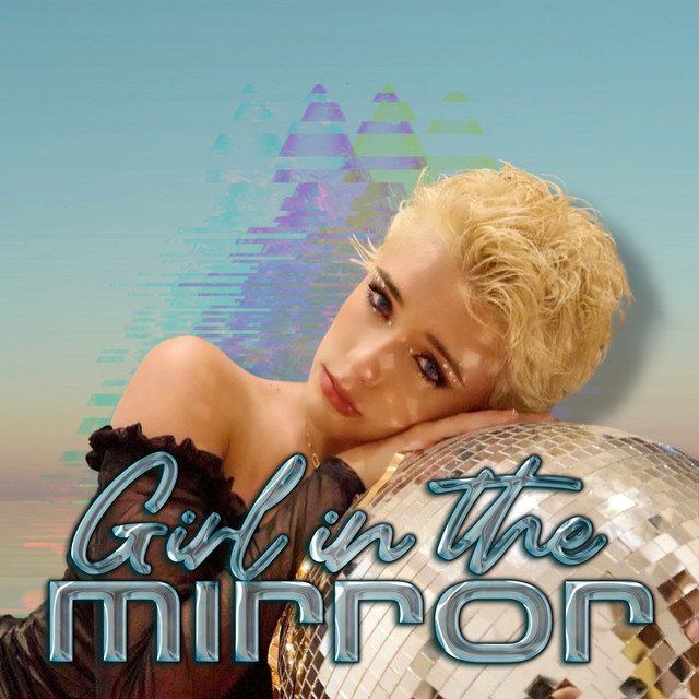 Read more about the article Kira Peace Kisses The “Girl in The Mirror”